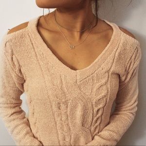 Light pink fuzzy sweater. Cold shoulder